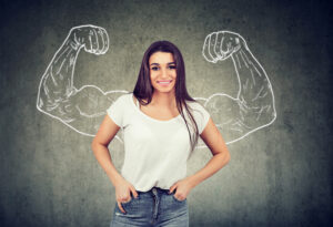 Woman on a background of a muscle picture